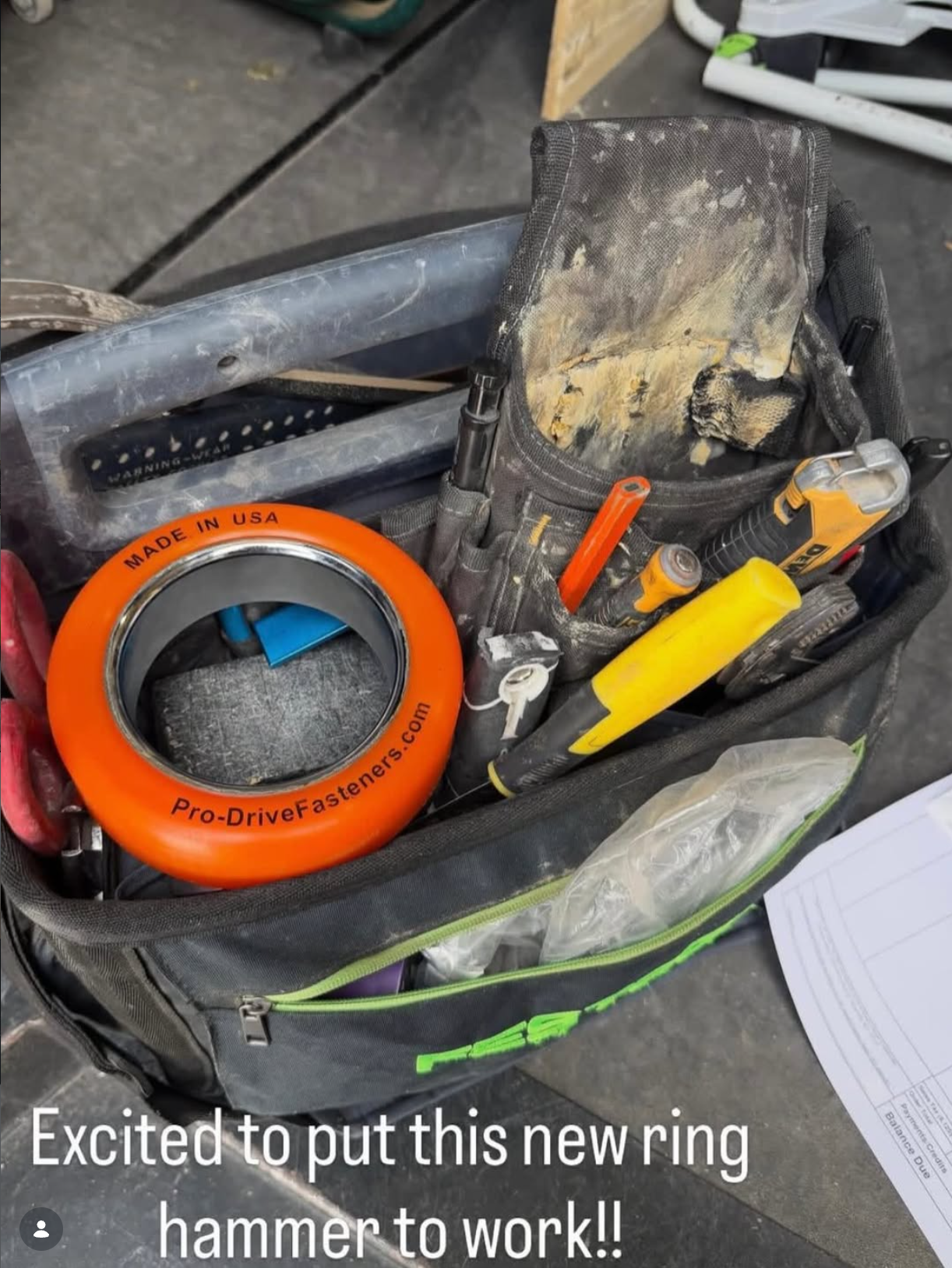 A Pro-Drive Fasteners® tapping ring sitting in a tool bag with flooring tools