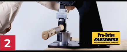 Pro-Drive Fasteners® Tipper-De-Tipper step 2 of 3: Align mallet head and press down.